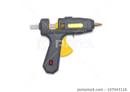 Hot glue gun wireless isolated on white background. Electric hot glue gun isolated on white for hand made and repair. Hot glue gun wireless isolated on white background. Electric hot glue gun isolated on white for hand made and repair. 107043116