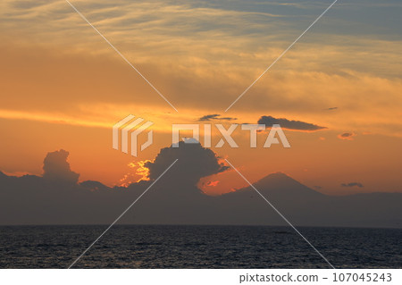 Sunset over the sea 107045243
