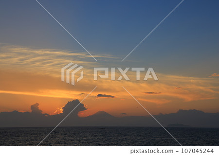 Sunset over the sea 107045244