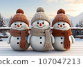 cute family snowman, wearing a knitted scarf and hat 107047213