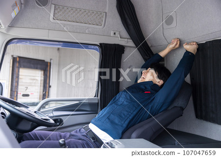Truck driver driver taking a break Truck driver driver taking a break 107047659
