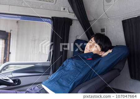 Truck driver driver taking a break Truck driver driver taking a break 107047664