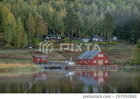 Swedish houses and mountain ant the sea at skuleberget campsite caravan camping in Hoga Kusten Sweden Swedish houses and mountain ant the sea at skuleberget campsite caravan camping in Hoga Kusten Sweden 107050068