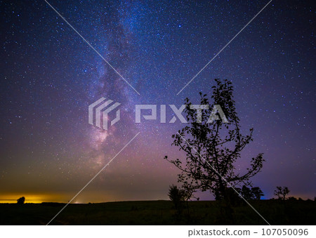 Night landscape with colorful Milky Way, autumn sky 107050096