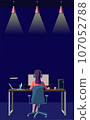 Rear view of a woman operating a computer in a dark room. remote work. Freelance. Side job. game. 107052788