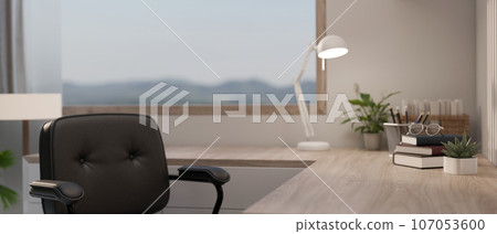 Close-up image of a copy space on a wooden corner table in a modern minimal home workspace 107053600