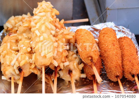 This is a potato hot dog, a delicious Korean food. This is a potato hot dog, a delicious Korean food. 107054080