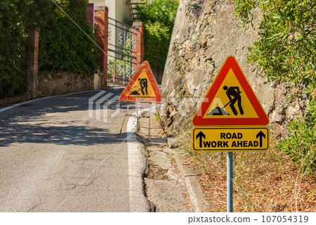 Triangular Road Work Ahead Sign or Work in Progress Sign 107054319