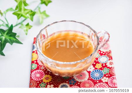 Hattai tea in a teacup Hattai tea in a teacup 107055019