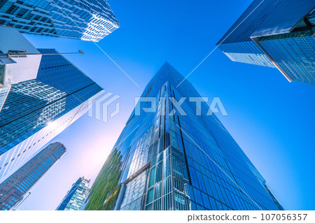 New view of Tokyo cityscape in Japan. Six buildings in Shibuya, green walls, and sunlight. Kaleidoscope city Shibuya... A light of hope that will lead to a new era after the coronavirus New view of Tokyo cityscape in Japan. Six buildings in Shibuya, green walls, and sunlight. Kaleidoscope city Shibuya... A light of hope that will lead to a new era after the coronavirus 107056357