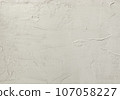 Background material of white painted wall, texture of old concrete wall painted with paint 107058227