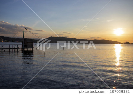 Lake Togo and sunset Lake Togo and sunset 107059381