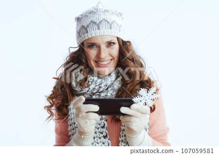 smiling stylish woman using phone smiling stylish woman using phone 107059581