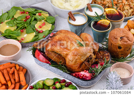 Christmas festive dinner with traditional dishes Christmas festive dinner with traditional dishes 107061084