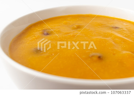 Pumpkin porridge on white background Pumpkin porridge on white background 107063337