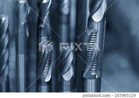 Close-up scene group of the used  solid end mill. 107065129