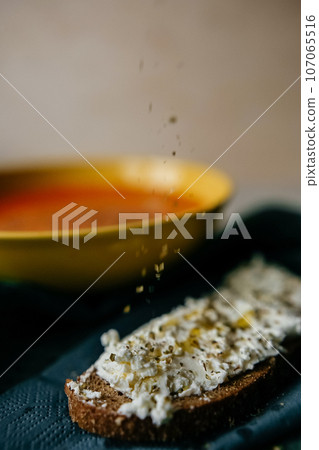 slice of bread with feta cheese seasoned with olive oil slice of bread with feta cheese seasoned with olive oil 107065516