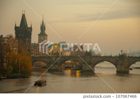 landscape with Vltava river, Charles Bridge and boat 107067466