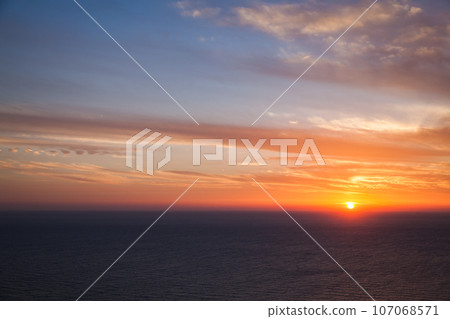 Colorful dramatic sky at sunset. Zakynthos, Greece Colorful dramatic sky at sunset. Zakynthos, Greece 107068571