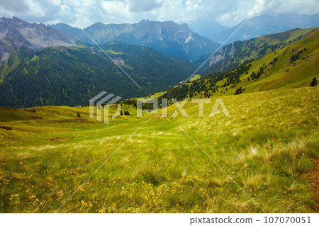 landscape with mountains, hills, clouds and meadow landscape with mountains, hills, clouds and meadow 107070051