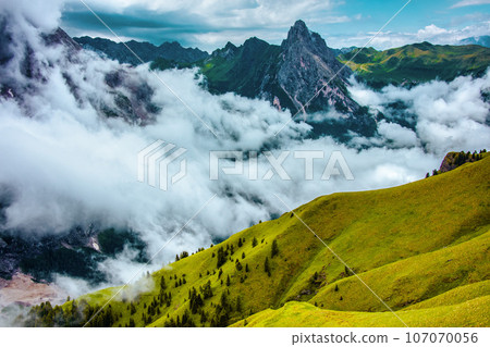 landscape with mountains, hills, clouds and trees 107070056