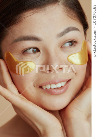 modern asian woman with eye patches 107070165