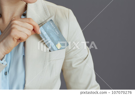 Modern business owner woman in light business suit Modern business owner woman in light business suit 107070276