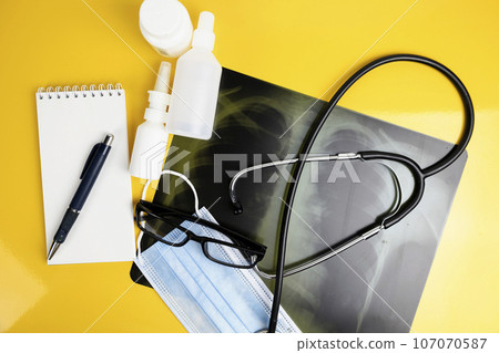 x-ray of the lungs, X-ray film of the patient. medical concept. Coronavirus infection COVID-19 x-ray of the lungs, X-ray film of the patient. medical concept. Coronavirus infection COVID-19 107070587
