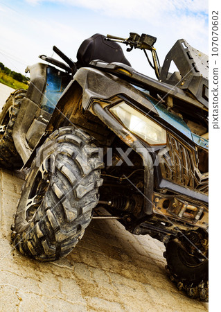 A kind of ATV in nature. Off-road driving on an all-terrain vehicle. Promotional postcard. A kind of ATV in nature. Off-road driving on an all-terrain vehicle. Promotional postcard. 107070602