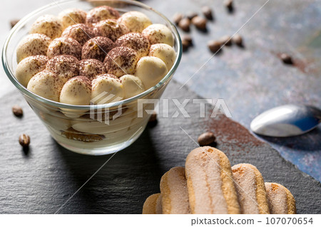 Tiramisu dessert. Delicious Italian dessert in a glass 107070654