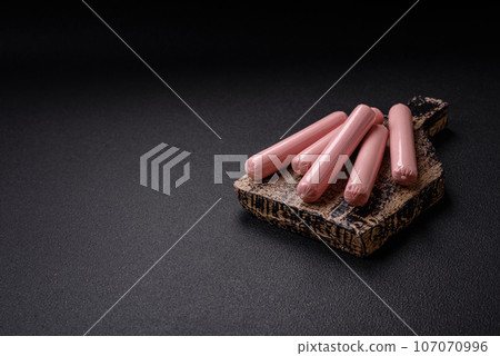 Delicious fresh vegetarian sausage or sausage made from vegetable protein tofu or seitan 107070996