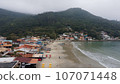 View at the beach and the village at Florianopolis, cloudy rainy day.  107071448