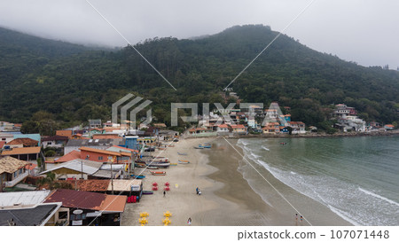 View at the beach and the village at Florianopolis, cloudy rainy day.  107071448