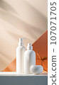 Background from a set of female professional cosmetics for face and body care. Cosmetic tubes with skin care product. 107071705