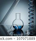 Laboratory glassware. Chemical industry. Scientific experimental equipment. Medical pharmacy lab test. Scientific research. Transparent liquid in a bottle. Biology, chemistry, biochemistry background 107071889