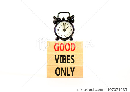 Good vibes only symbol. Concept word Good vibes only on beautiful wooden block. Black alarm clock. Beautiful white table white background. Business motivational good vibes only concept. Copy space. Good vibes only symbol. Concept word Good vibes only on beautiful wooden block. Black alarm clock. Beautiful white table white background. Business motivational good vibes only concept. Copy space. 107071985