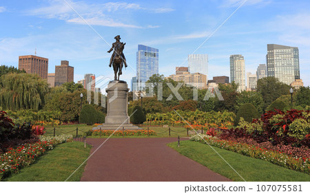 George Washington statue and Boston skyline in Public Garden, USA 107075581
