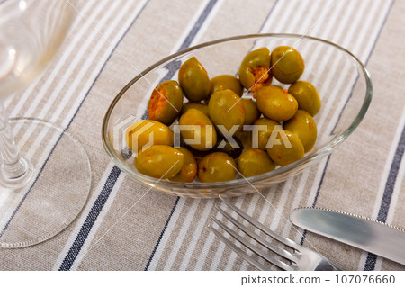 Delicious pickled green olives with cucumber, spanish dish - Olivas verdes y pepinos Delicious pickled green olives with cucumber, spanish dish - Olivas verdes y pepinos 107076660