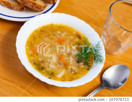 Rassolnik - Traditional Russian soup with pickled cucmbers 107076723