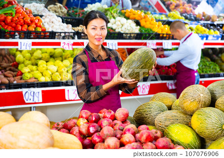 Supermarket workers in salesroom Supermarket workers in salesroom 107076906