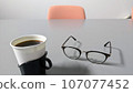 coffee and glasses on the table 107077452