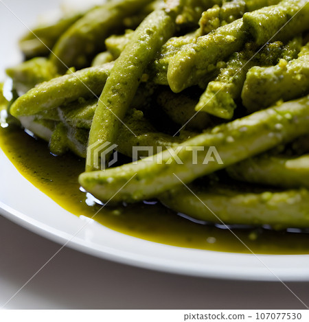 pesto alla genovese served on plate ingredients parmesan basil pine nuts pesto alla genovese served on plate ingredients parmesan basil pine nuts 107077530