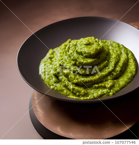 pesto alla genovese served on plate ingredients parmesan basil pine nuts pesto alla genovese served on plate ingredients parmesan basil pine nuts 107077546