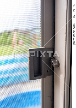 Interior sliding screen door hardware and flip latch Interior sliding screen door hardware and flip latch 107079192