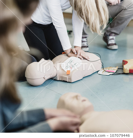 First aid cardiopulmonary resuscitation course using automated external defibrillator device, AED. 107079446