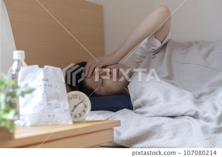 A man who falls asleep due to poor physical condition A man who falls asleep due to poor physical condition 107080214