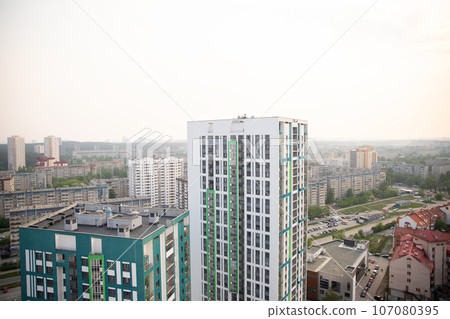 smog smoke over town. city panorama, street, townhouse, houses, buildings. smoke from summer forest fires, bad ecology smog smoke over town. city panorama, street, townhouse, houses, buildings. smoke from summer forest fires, bad ecology 107080395