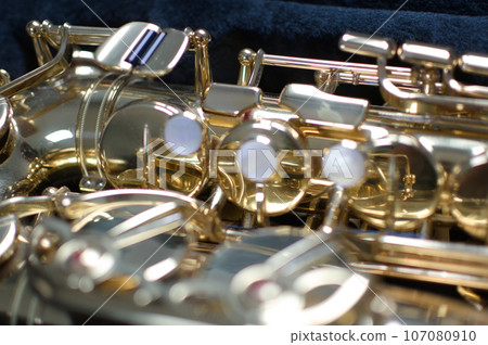 Alto saxophone body closed shot Alto saxophone body closed shot 107080910