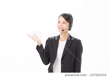 photo of a woman wearing a headset 107081034