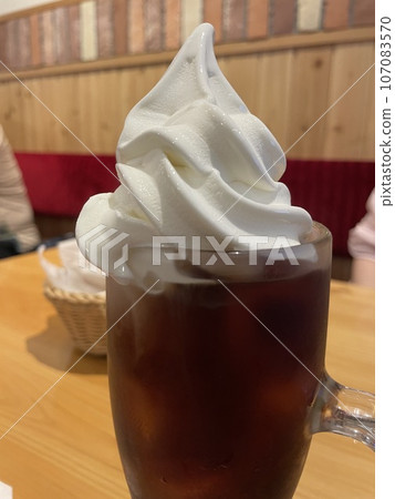 Iced coffee float: A classic summer drink topped with soft serve ice cream. Iced coffee float: A classic summer drink topped with soft serve ice cream. 107083570